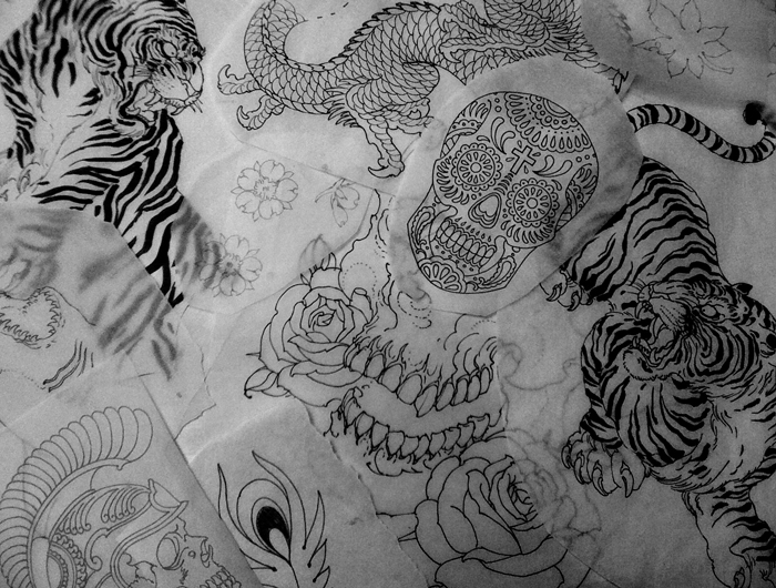 Tattoo drawings from the wall 